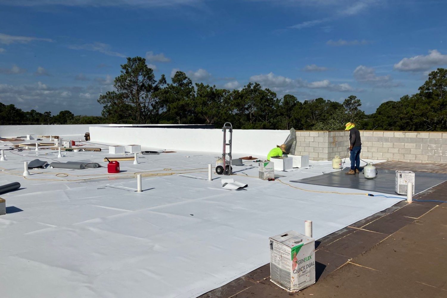 Medium shot man working with protection helmet<br />